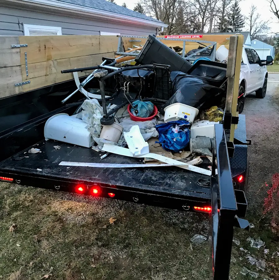 Roll-off dumpster delivered to a residential driveway in Tarrant